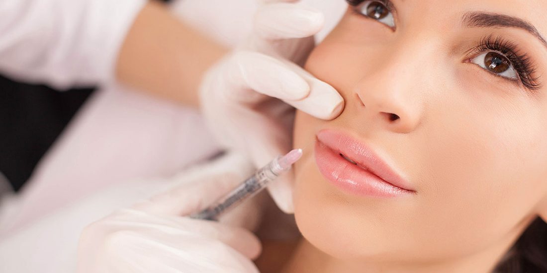 Lip filler treatment being carried out at Clinic 8, West Malling